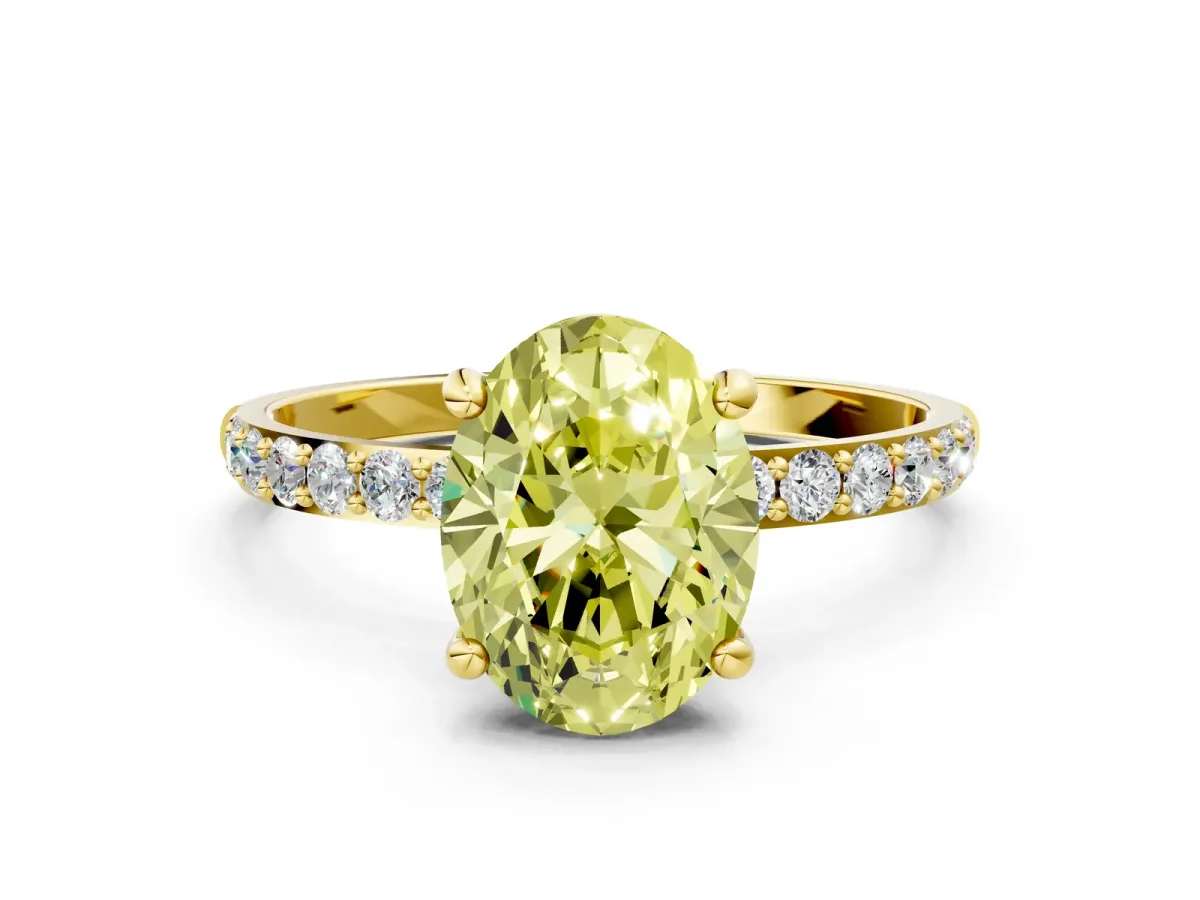 Fancy Yellow Oval Cut Diamond Solitaire Ring with Round Pavé Band and Prong Setting Yellow gold