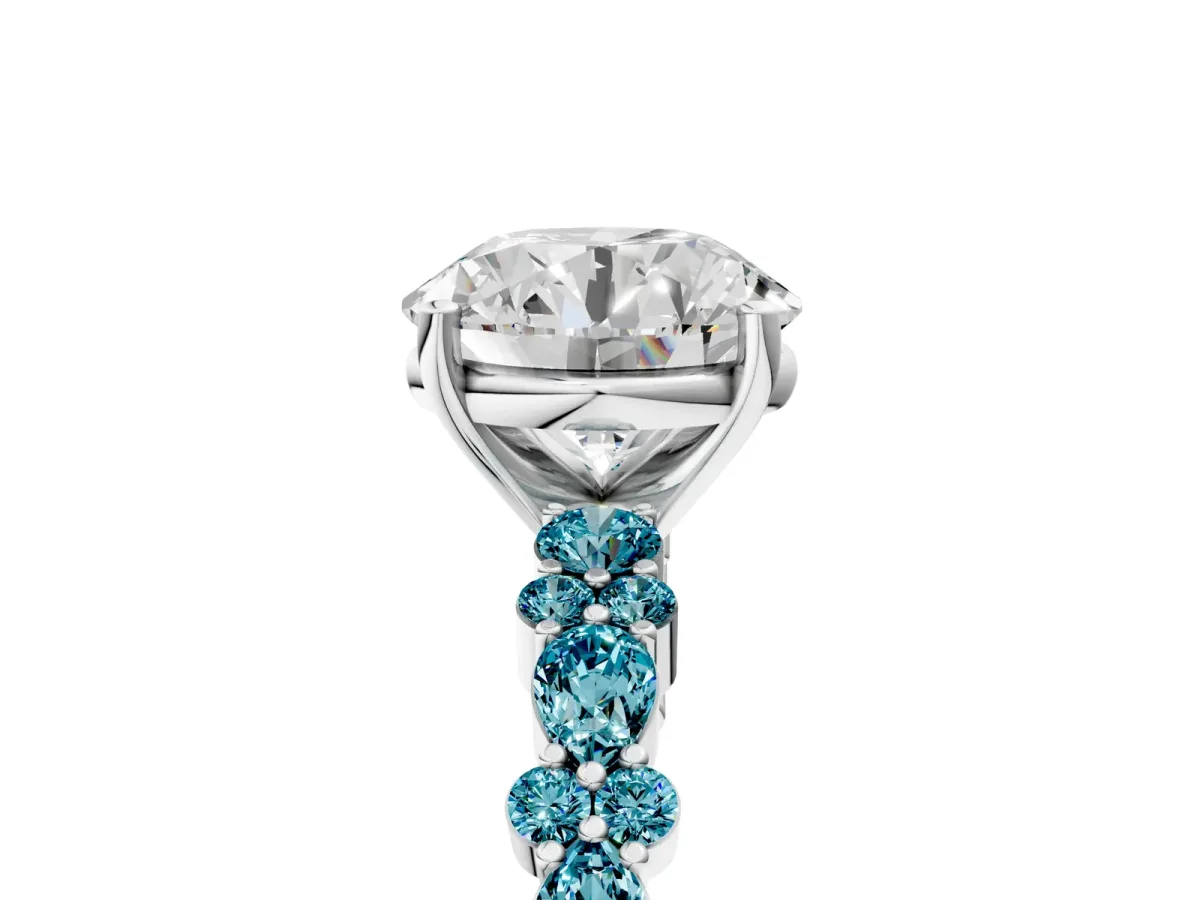 Round Cut Diamond Side Stone Solitaire Ring with Round Tanzanite and Four-Prong Setting Silver