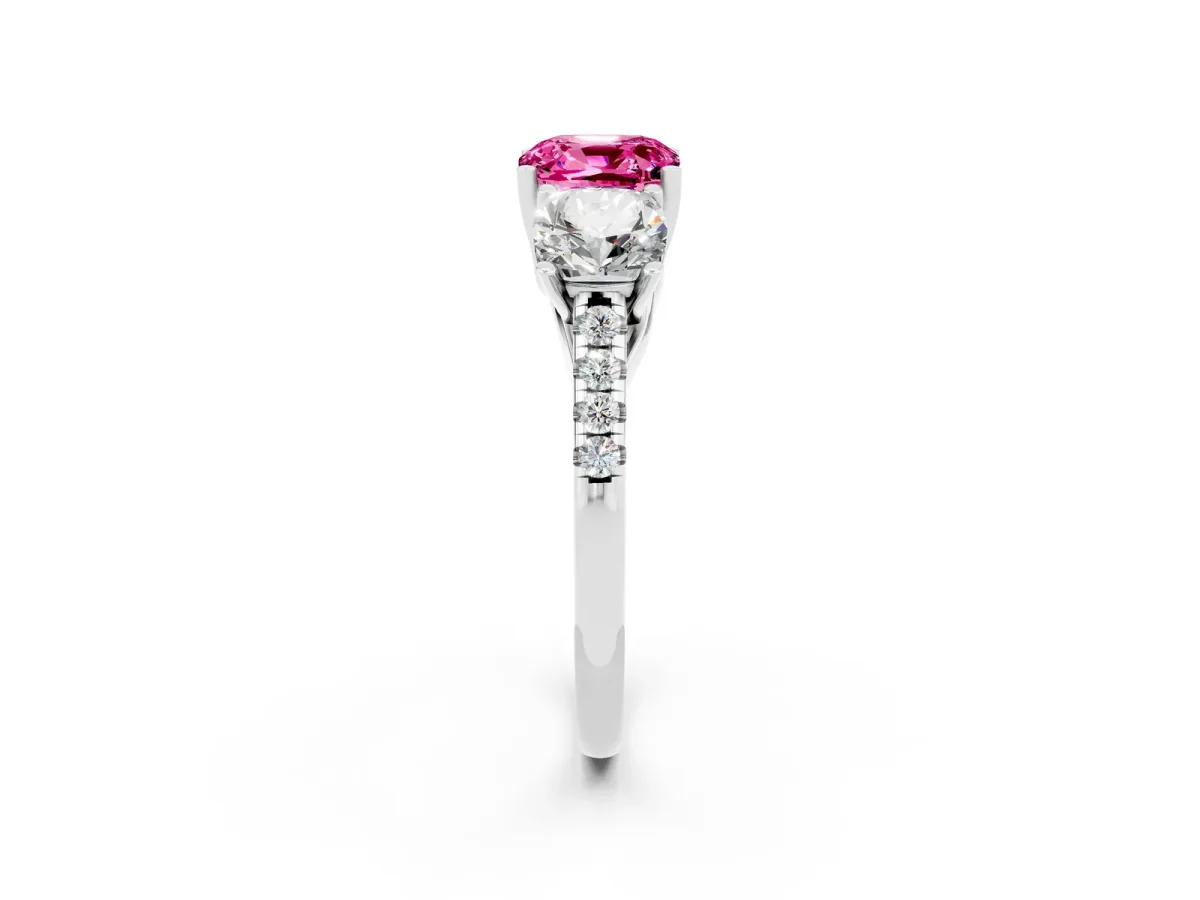 Three-Stone Cushion Cut Pink Sapphire Ring with Round Pavé Band and Prong Setting Platinum
