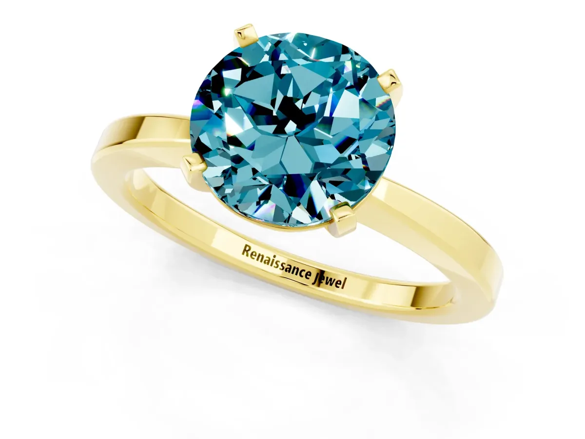 Round Cut Blue Topaz Solitaire Engagement Ring with Classic Band and Four-Prong Setting Yellow gold