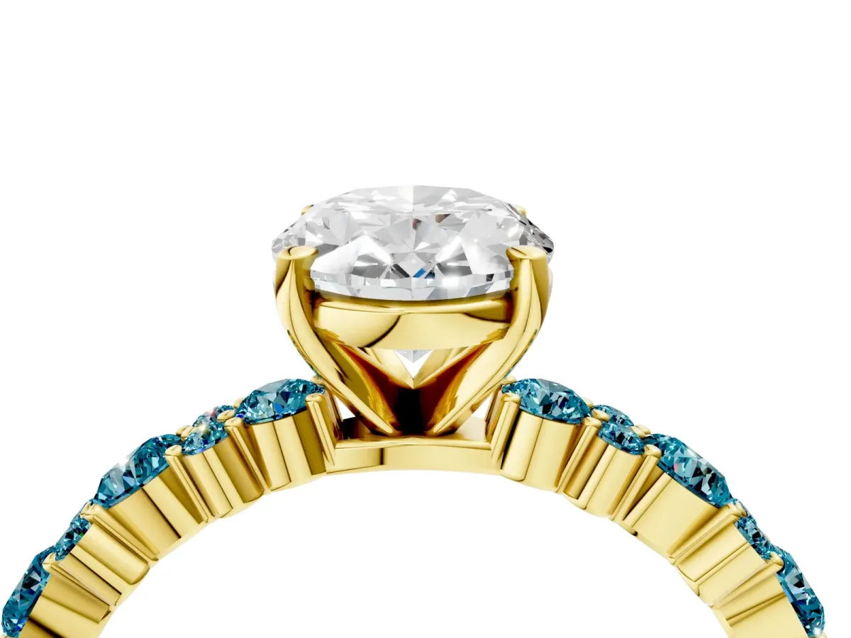 Oval Cut Diamond Side Stone Solitaire Ring with Round Blue Topaz and Four-Prong Setting Yellow gold