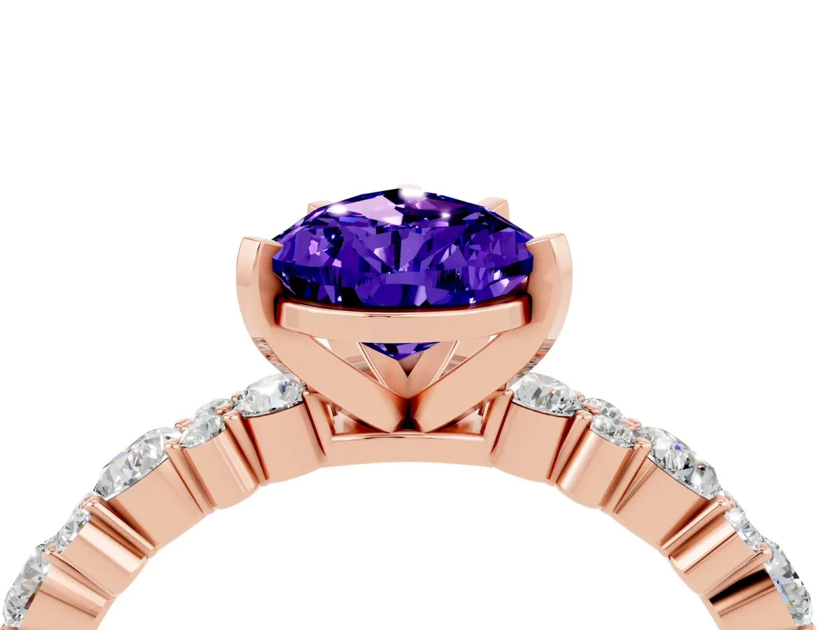 Pear Cut Tanzanite Side Stone Solitaire Ring with Round and Four-Prong Setting Rose gold
