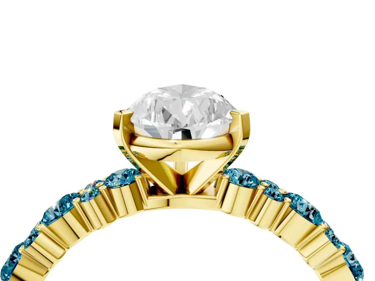 Pear Cut Diamond Side Stone Solitaire Ring with Round Blue Topaz and Four-Prong Setting Yellow gold