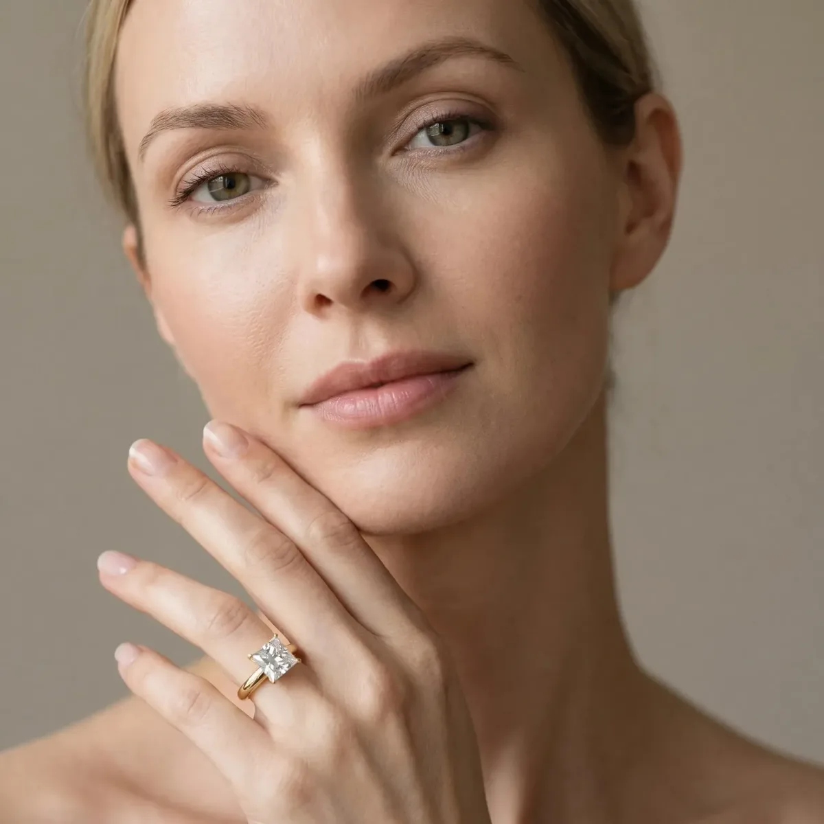 Princess Cut Diamond Solitaire Engagement Ring with Round Band and Four-Prong Setting Yellow gold
