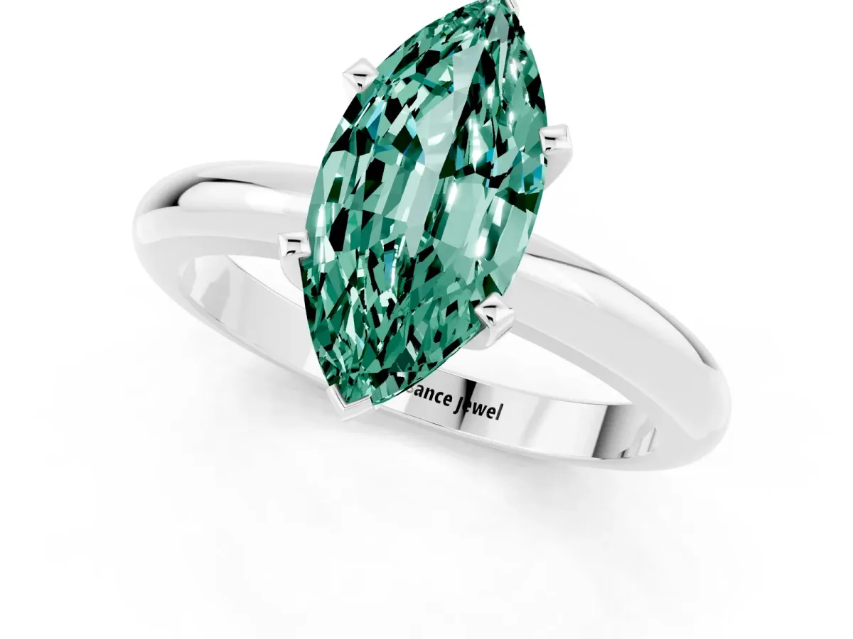 Marquise Cut Green Sapphire Solitaire Engagement Ring with Round Band and Four-Prong Setting Silver