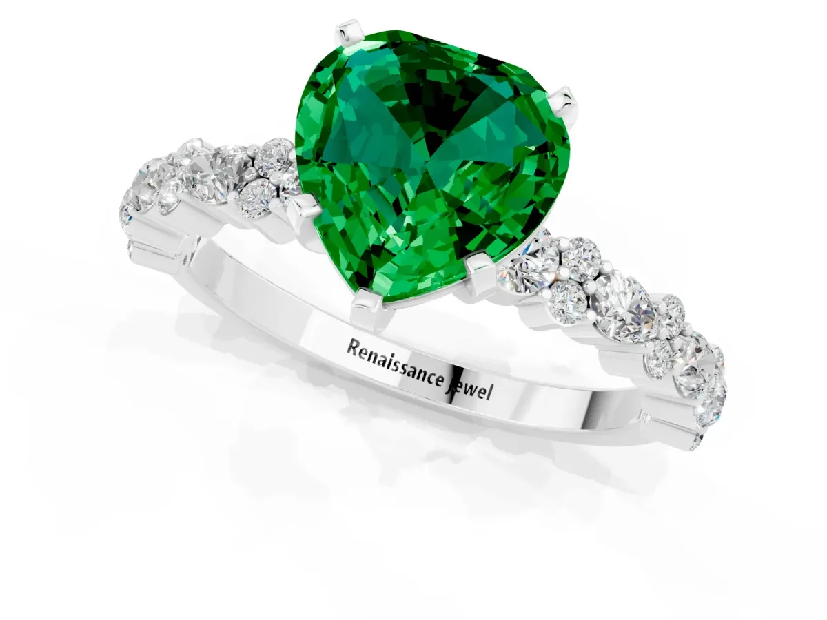 Heart Cut Emerald Side Stone Solitaire Ring with Round and Four-Prong Setting Silver