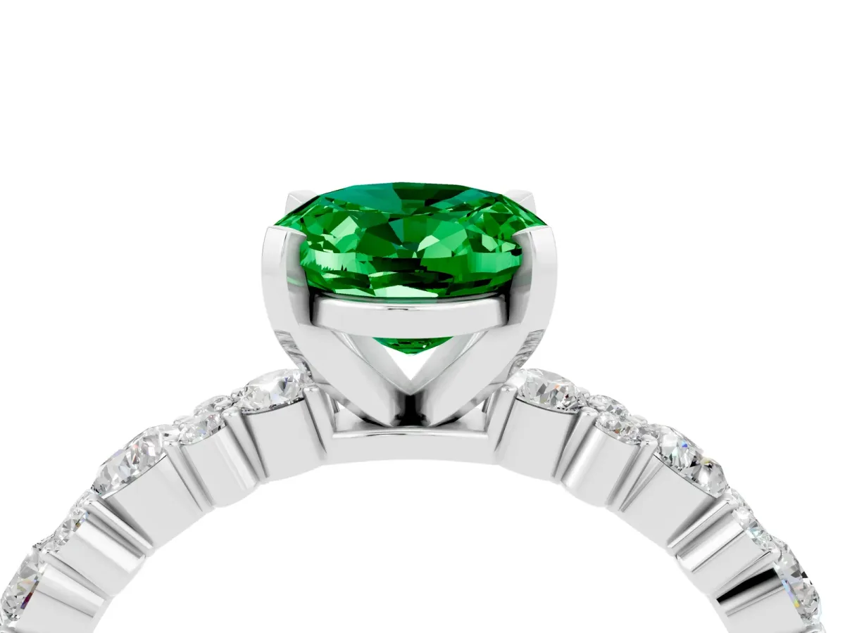 Oval Cut Emerald Side Stone Solitaire Ring with Round and Four-Prong Setting Platinum