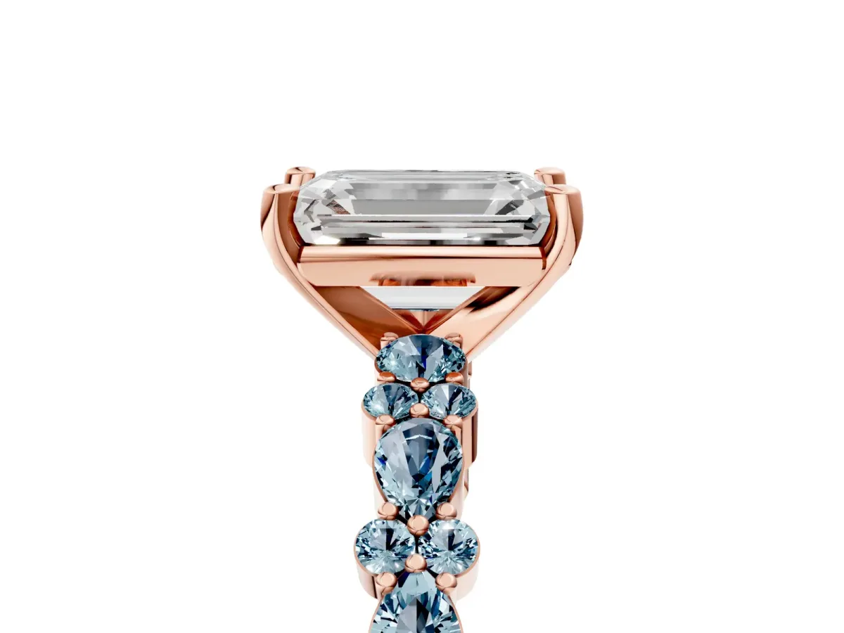 Emerald Cut Diamond Side Stone Solitaire Ring with Round Aquamarine and Four-Prong Setting Rose gold