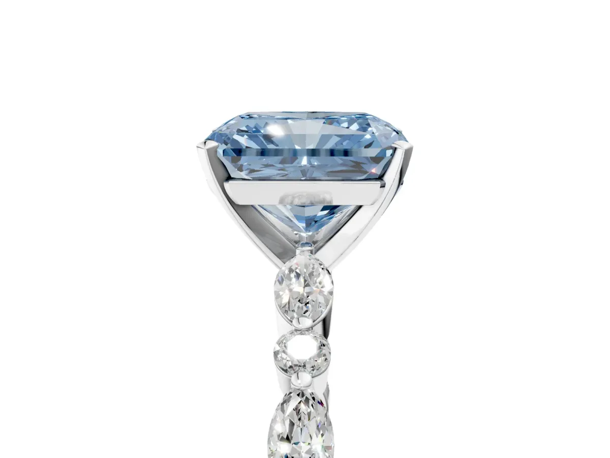 Fancy Blue Radiant Cut Diamond Ring with Marquise and Round Side Stones and Four-Prong Setting Silver