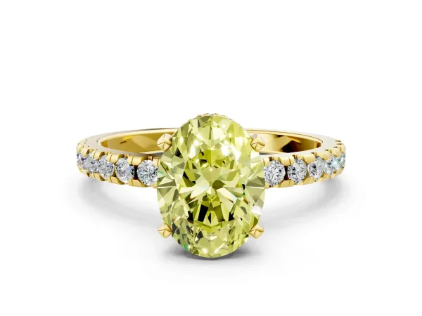 Fancy Yellow Oval Cut Diamond Solitaire Ring with Round Pavé Band and Four-Prong Setting Yellow gold