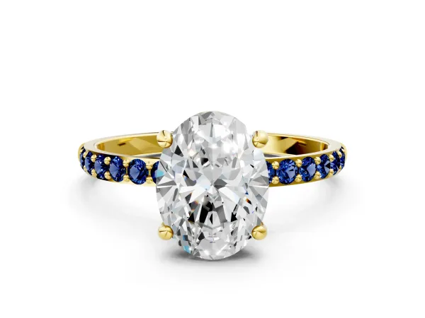 Oval Cut Diamond Solitaire Ring with Round Blue Sapphire Pavé Band and Prong Setting Yellow gold