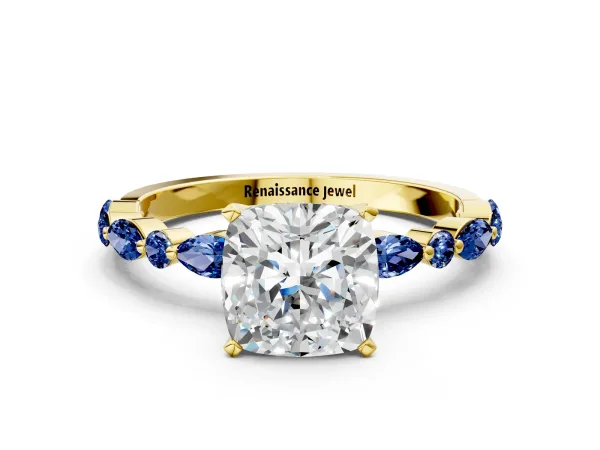 Cushion Cut Diamond Ring with Marquise and Round Blue Sapphire Side Stones and Four-Prong Setting Yellow gold