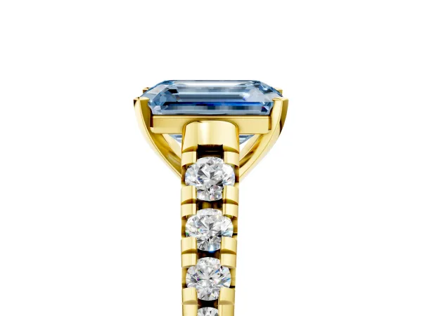 Fancy Blue Emerald Cut Diamond Cathedral Solitaire Ring with Round Pavé Band Yellow gold