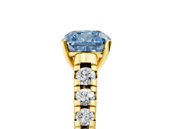 Fancy Blue Cushion Cut Diamond Cathedral Solitaire Ring with Round Pavé Band Yellow gold