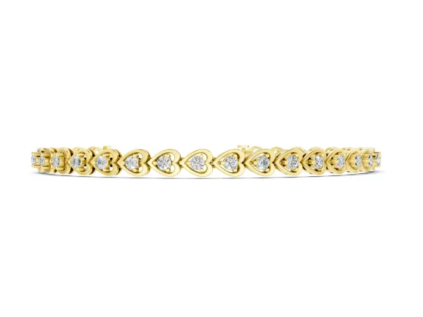 Heart-Shaped Diamond Tennis Bracelet with Channel Setting and Four-Prong Setting Yellow gold