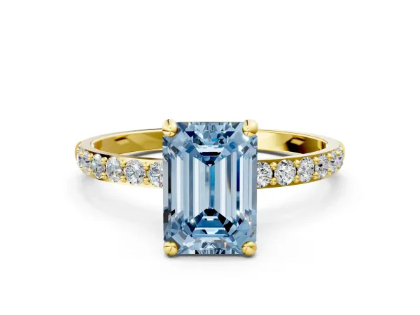Fancy Blue Emerald Cut Diamond Solitaire Ring with Round Pavé Band and Prong Setting Yellow gold