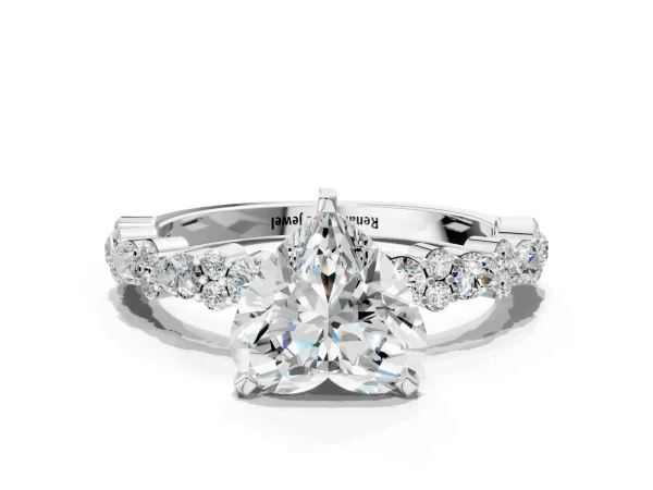 Heart Cut Diamond Side Stone Solitaire Ring with Round and Four-Prong Setting Platinum