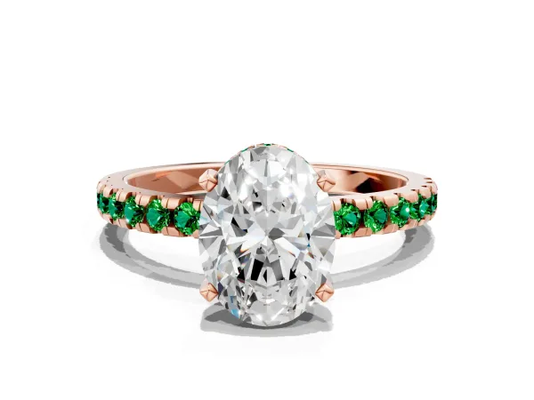 Oval Cut Diamond Solitaire Ring with Round Emerald Pavé Band and Four-Prong Setting Rose gold