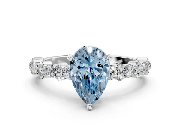 Fancy Blue Pear Cut Diamond Side Stone Solitaire Ring with Round and Four-Prong Setting Platinum