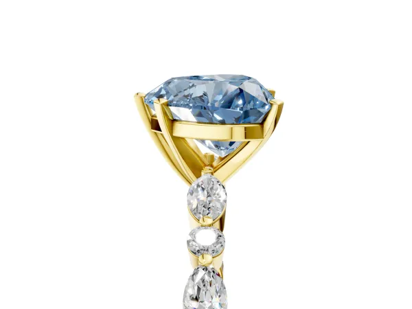 Fancy Blue Heart Cut Diamond Ring with Marquise and Round Side Stones and Four-Prong Setting Yellow gold