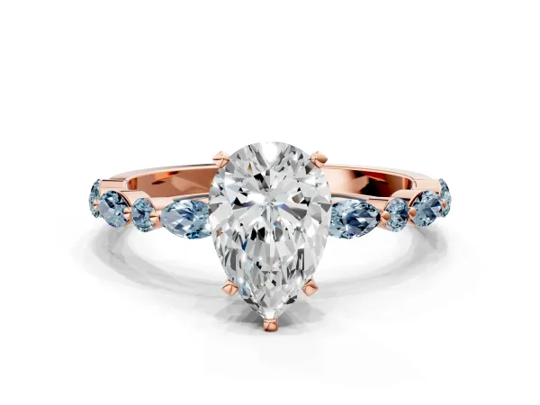 Pear Cut Diamond Ring with Marquise and Round Aquamarine Side Stones and Four-Prong Setting Rose gold