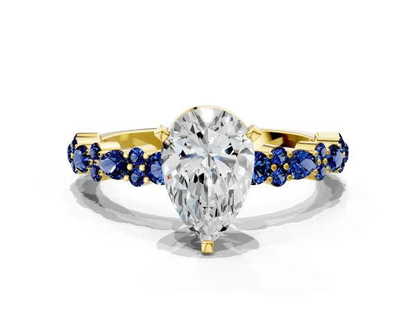 Pear Cut Diamond Side Stone Solitaire Ring with Round Blue Sapphire and Four-Prong Setting Yellow gold