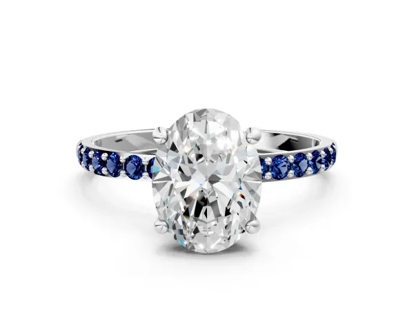 Oval Cut Diamond Solitaire Ring with Round Blue Sapphire Pavé Band and Prong Setting Platinum