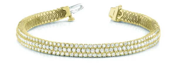 Triple Row Round Diamond Tennis Bracelet with Channel Set Stones and Four-Prong Setting Yellow gold