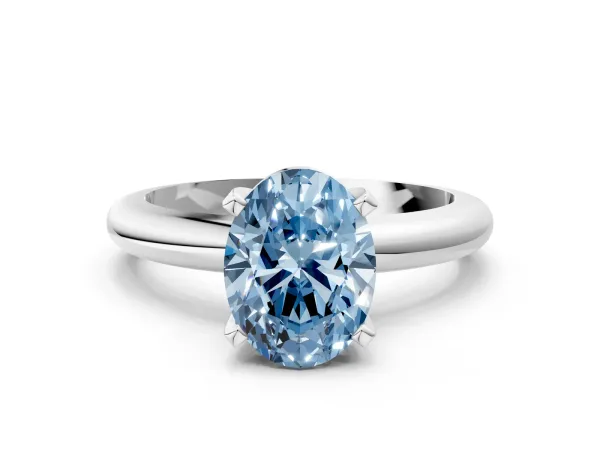 Fancy Blue Oval Cut Diamond Solitaire Engagement Ring with Round Band and Four-Prong Setting White gold