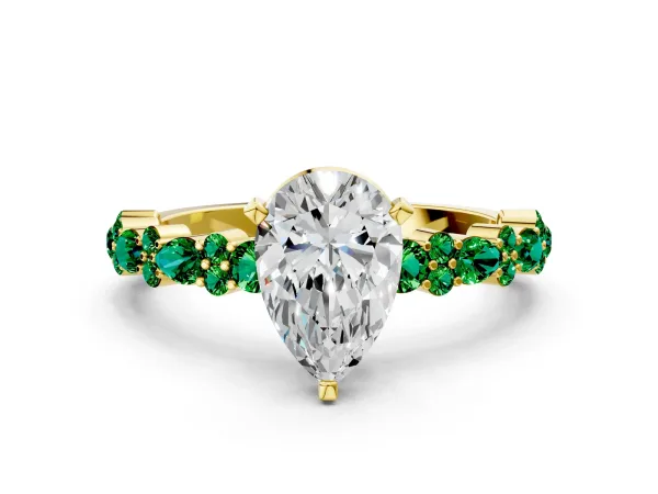 Pear Cut Diamond Side Stone Solitaire Ring with Round Emerald and Four-Prong Setting Yellow gold