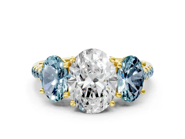 Three-Stone Oval Cut Diamond Ring with Round Aquamarine Pavé Band and Prong Setting Yellow gold