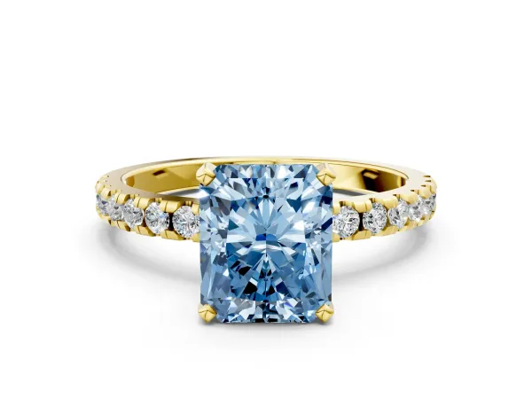 Fancy Blue Radiant Cut Diamond Solitaire Ring with Round Pavé Band and Four-Prong Setting Yellow gold