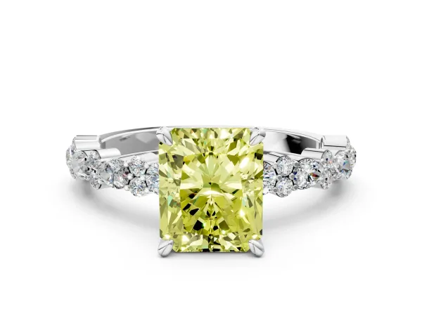 Fancy Yellow Radiant Cut Diamond Side Stone Solitaire Ring with Round and Four-Prong Setting Platinum