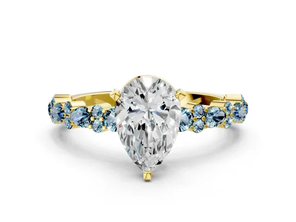 Pear Cut Diamond Side Stone Solitaire Ring with Round Aquamarine and Four-Prong Setting Yellow gold