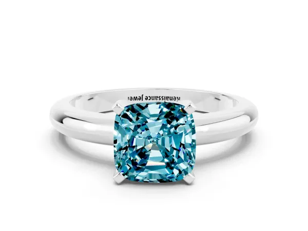 Cushion Cut Blue Topaz Solitaire Engagement Ring with Round Band and Four-Prong Setting White gold