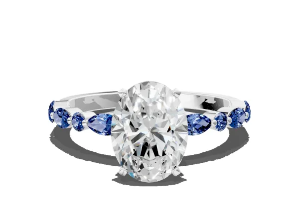 Oval Cut Diamond Ring with Marquise and Round Blue Sapphire Side Stones and Four-Prong Setting White gold