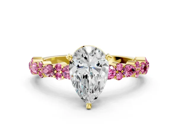 Pear Cut Diamond Side Stone Solitaire Ring with Round Pink Sapphire and Four-Prong Setting Yellow gold
