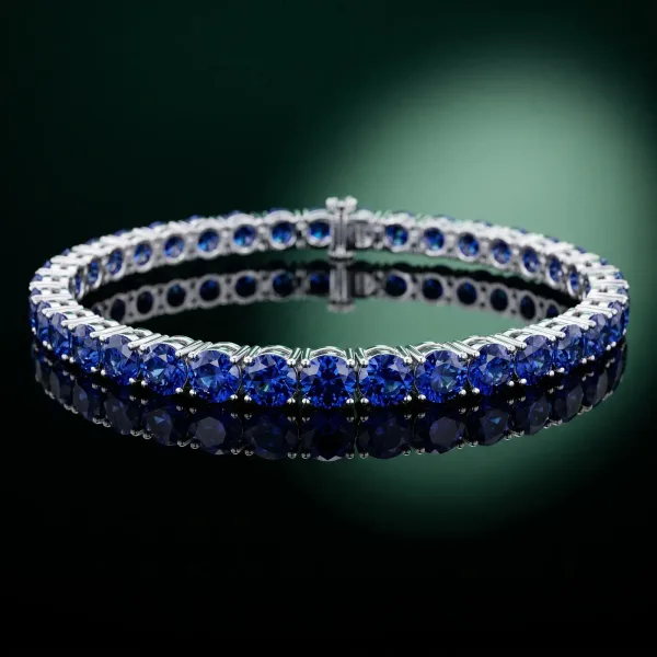 Round Brilliant Blue Sapphire Tennis Bracelet with Prong Setting White gold