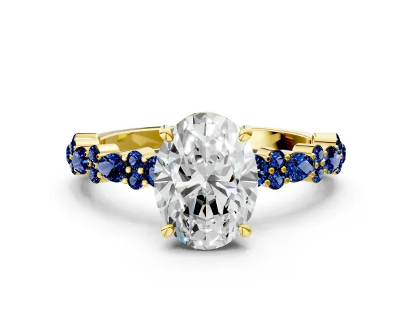 Oval Cut Diamond Side Stone Solitaire Ring with Round Blue Sapphire and Four-Prong Setting Yellow gold