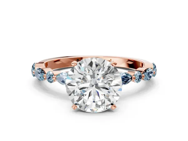 Round Cut Diamond Ring with Marquise and Round Aquamarine Side Stones and Four-Prong Setting Rose gold