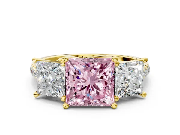 Fancy Pink Three-Stone Princess Cut Diamond Ring with Round Pavé Band and Prong Setting Yellow gold