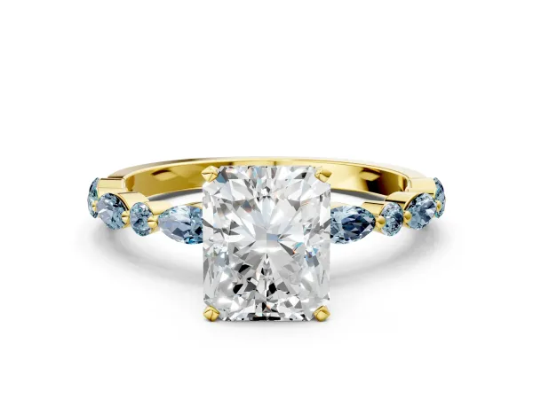 Radiant Cut Diamond Ring with Marquise and Round Aquamarine Side Stones and Four-Prong Setting Yellow gold