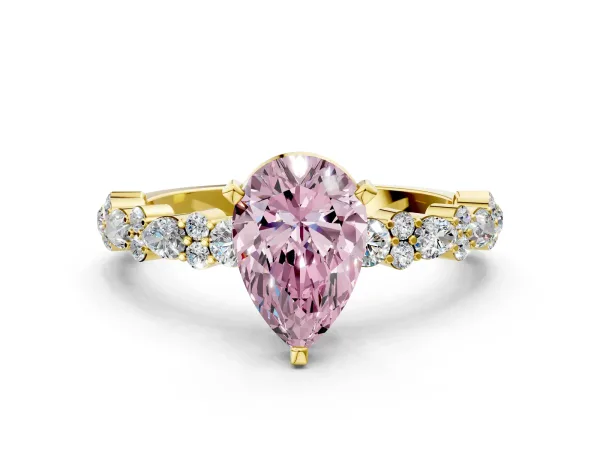 Fancy Pink Pear Cut Diamond Side Stone Solitaire Ring with Round and Four-Prong Setting Yellow gold