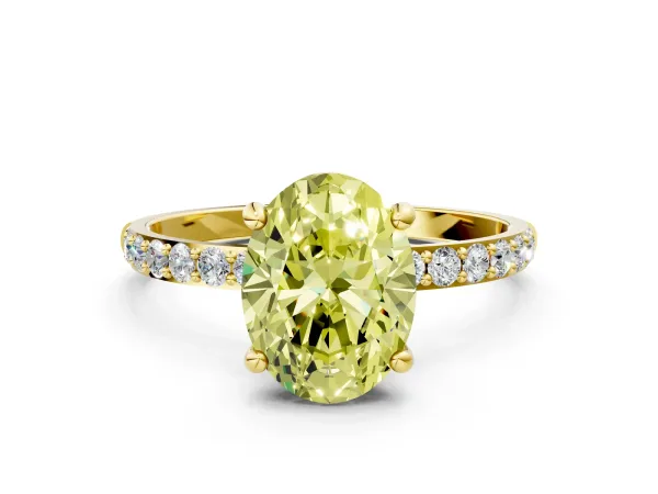Fancy Yellow Oval Cut Diamond Solitaire Ring with Round Pavé Band and Prong Setting Yellow gold