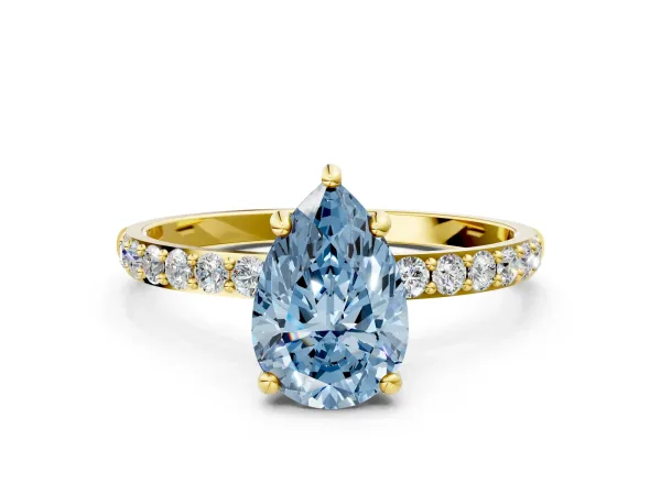 Fancy Blue Pear Cut Diamond Solitaire Ring with Round Pavé Band and Prong Setting Yellow gold